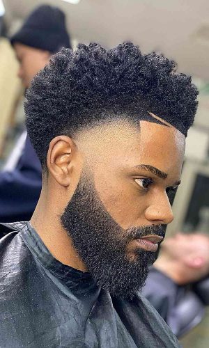 structured-afro-with-a-beard-fade-for-black-guys